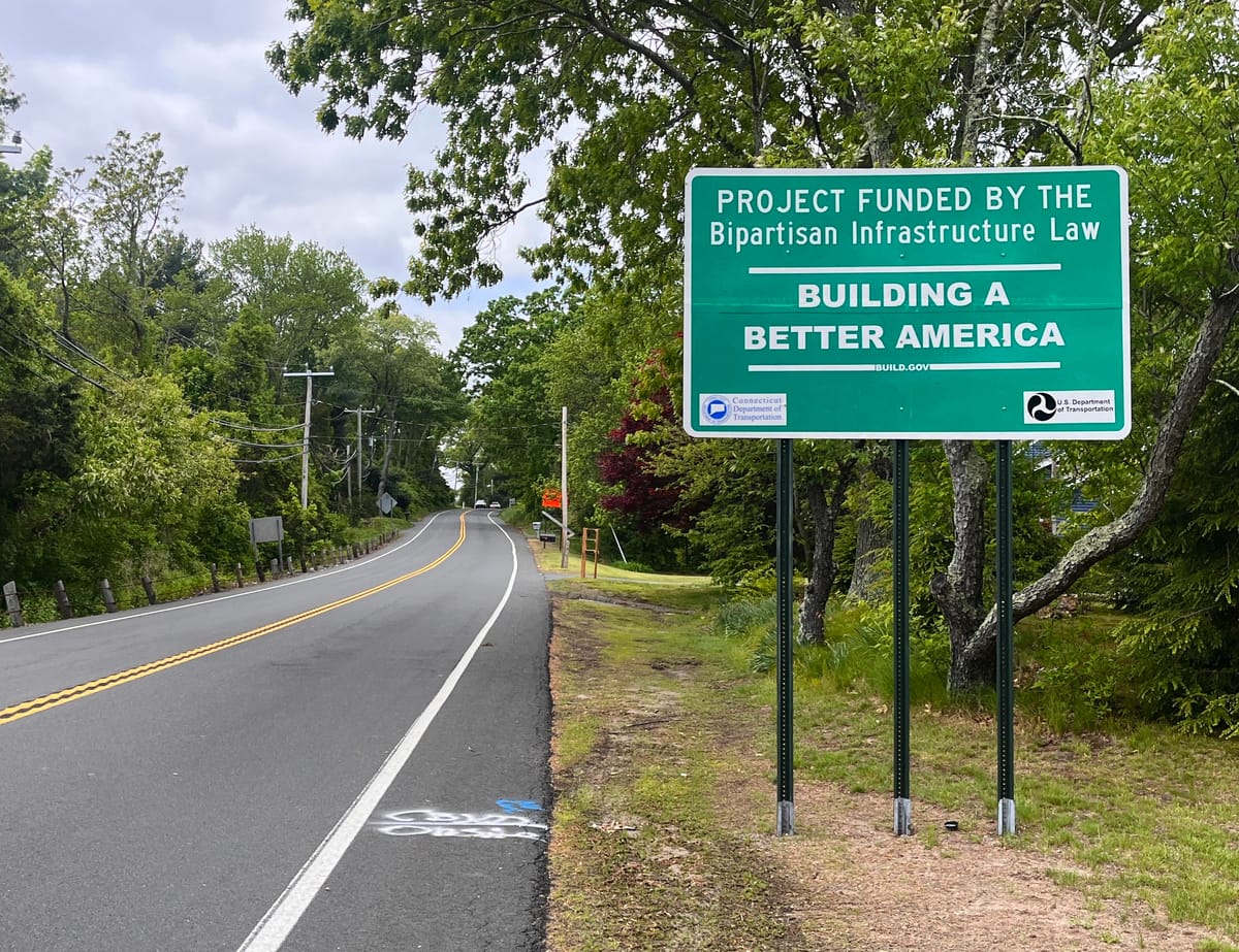 Roadway sign reading, "Project Funding by the Bipartisan Infrastructure Law."