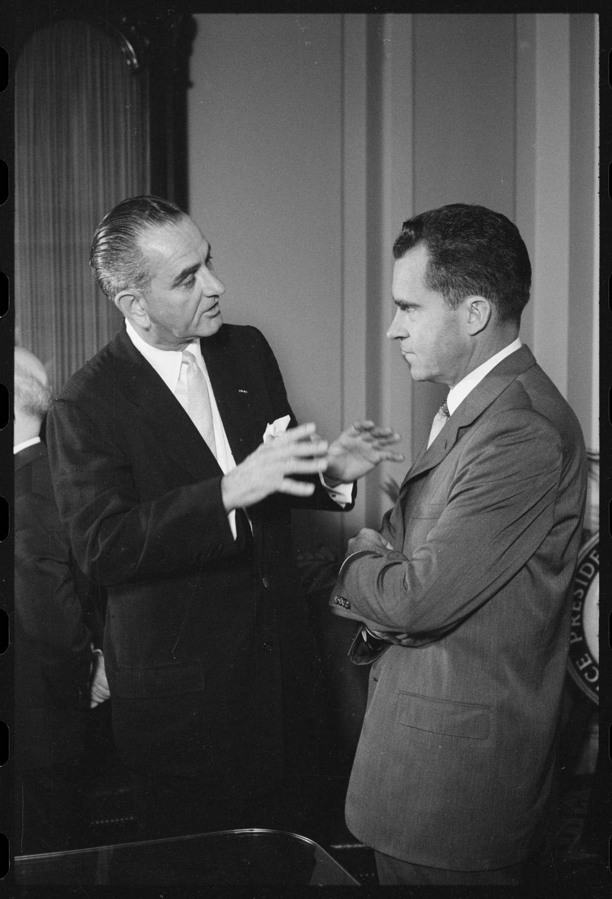 Senator Lyndon Johnson in conversation with Vice President Richard Nixon. 