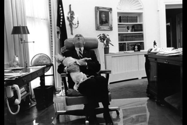 President Johnson and his dog Yuki howling together. 